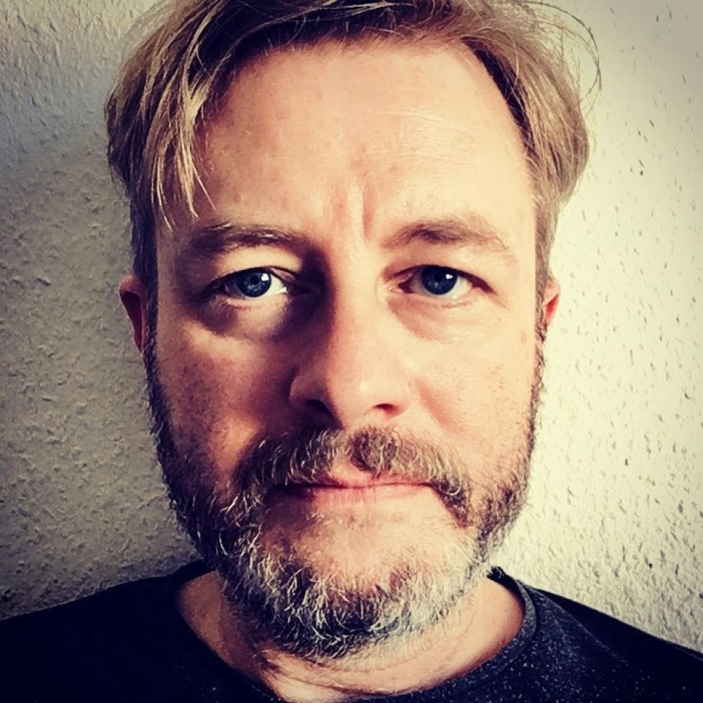 Porträtfoto von Darren Smith